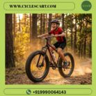Teen boy riding Avon Waka Waka fat tyre cycle on off-road forest trail kicking up dust | Cyclescart