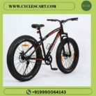 Studio shot of Avon Waka Waka 26 inch black and red fat tyre bicycle with side stand deployed | Cyclescart
