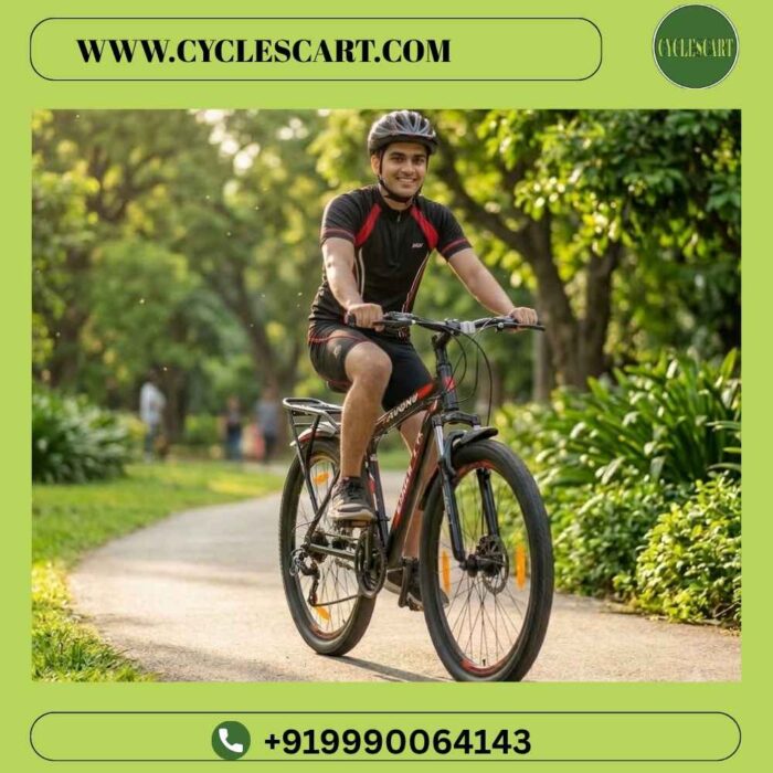 man-riding-avon-gamer-apex-geared-cycle-park- cyclescart Young cyclist riding Avon Gamer Apex 26T geared bicycle on sunny park pathway | Cyclescart