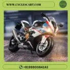 Front close-up view of BMW S1000RR die-cast superbike with glowing LED headlights and disc brakes | Cyclescart