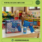 Blue electric bubble blaster gun with retail box packaging and bubble solution bottle displayed on wooden kids table | Cyclescart