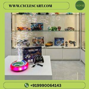 Close-up view of the central bubble dispenser and vibrant soccer graphic pattern of the RC bubble bumper car | Cyclescart