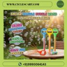 Smiley handle bubble wands in blue, yellow, and green standing on an outdoor wooden table highlighting huge multi-bubble waves | Cyclescart